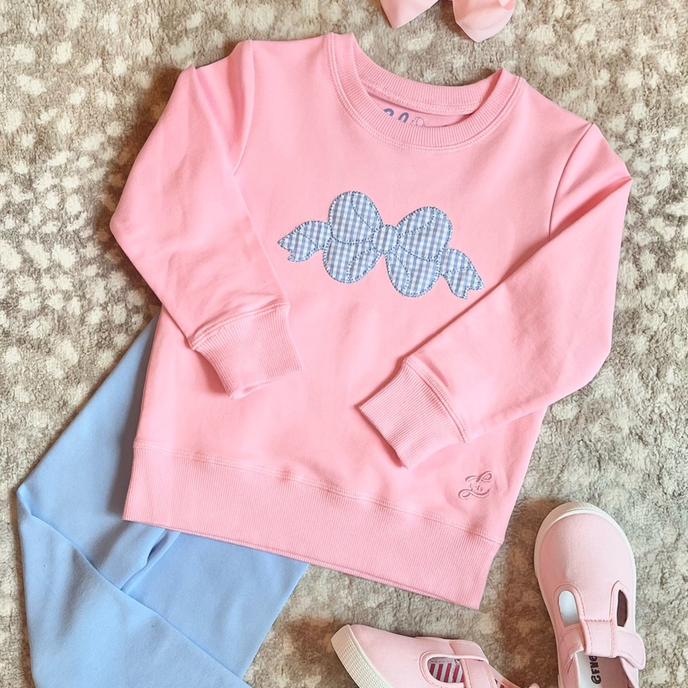 Pink Sweatshirt with Blue Bow Design